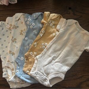 Set of 4 Kids One-Piece Bodysuits in White, Blue, and Mustard Floral